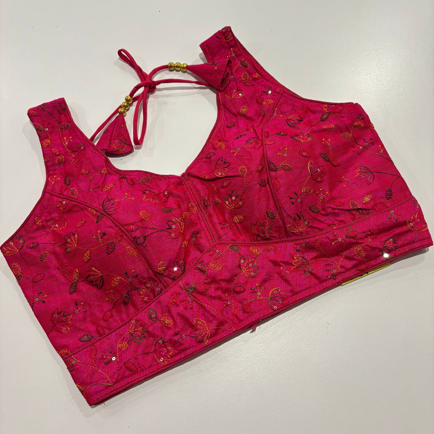 Rani Pink Readymade Blouse with Gold Embroidery & Attached Sleeve Fabric