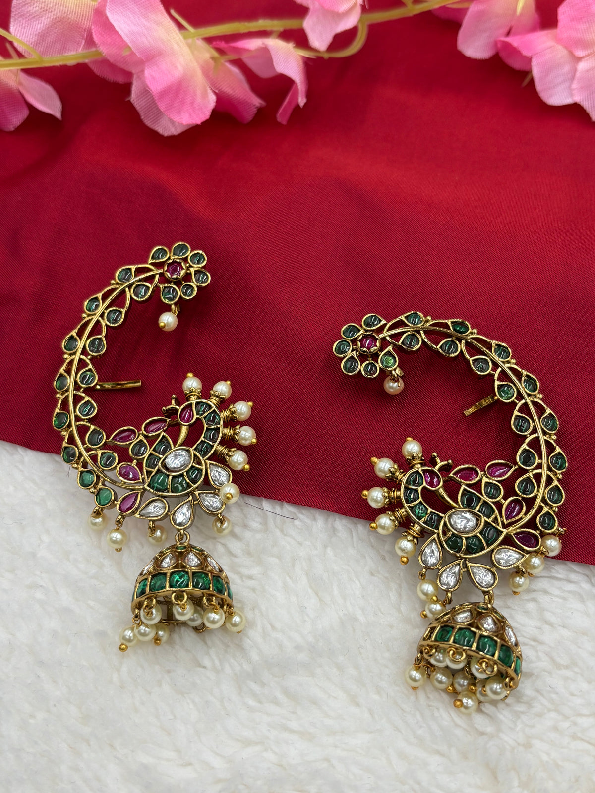 Peacock‑Style Jhumka Earcuff with Green, Ruby & White Stones – Antique Gold Finish