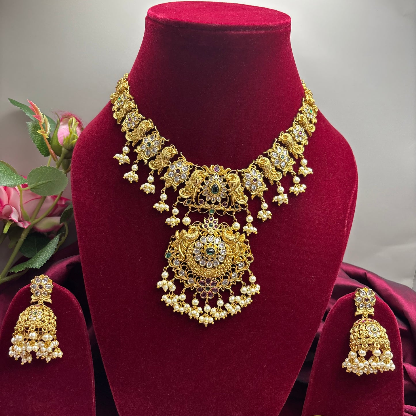 Peacock Grace – Matte Gold Necklace Set with CZ Sparkle & Pearl Accents