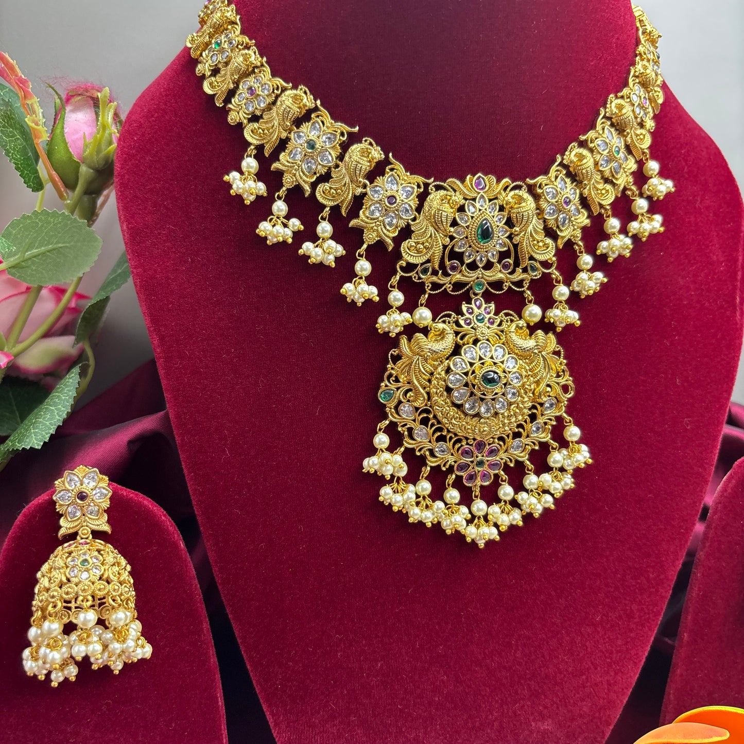 Peacock Grace – Matte Gold Necklace Set with CZ Sparkle & Pearl Accents