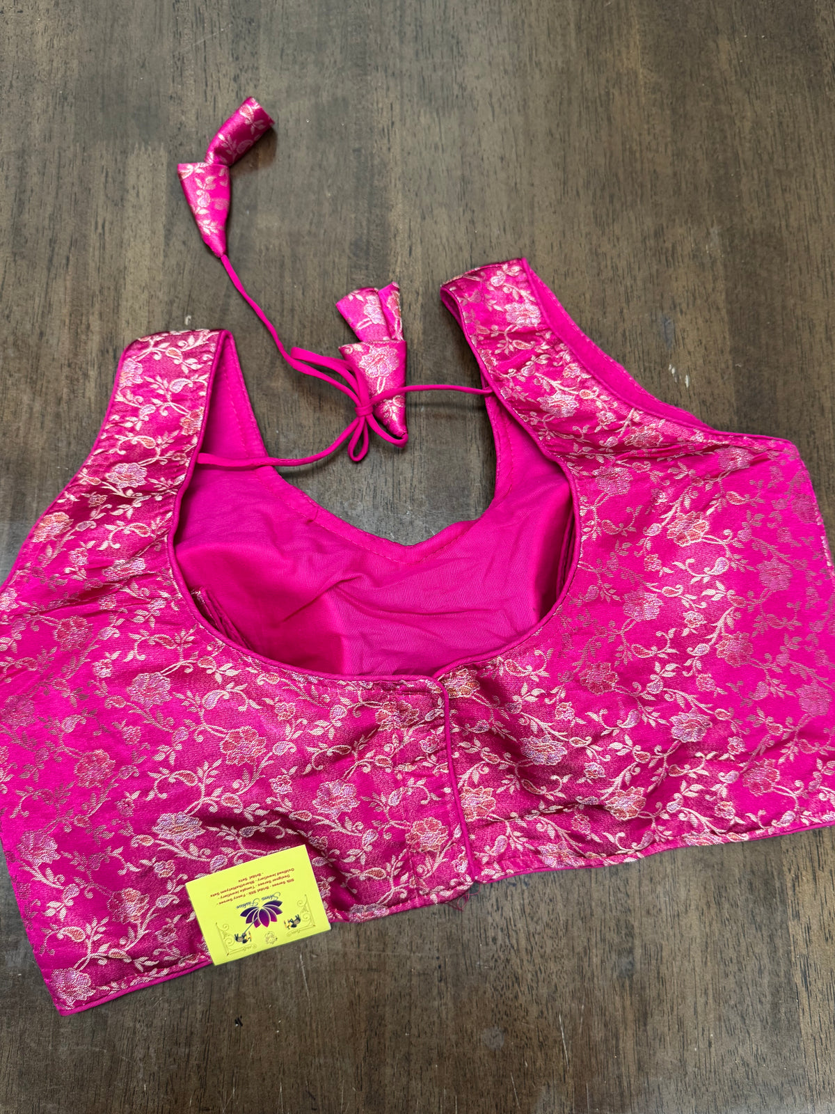 Festive Rani Pink Sleeveless Blouse with Gold Accents
