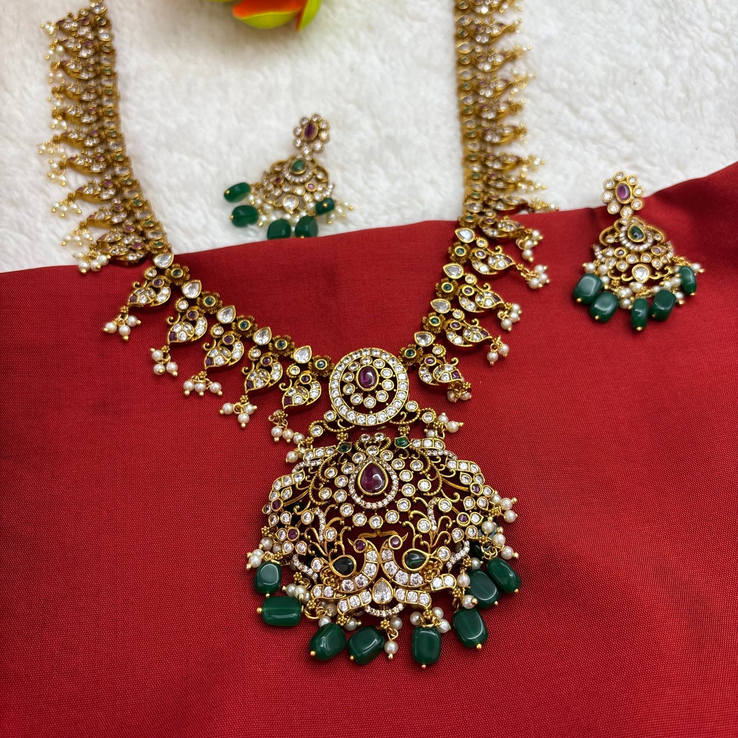 Premium quality matte gold finish long haram sets with green beads