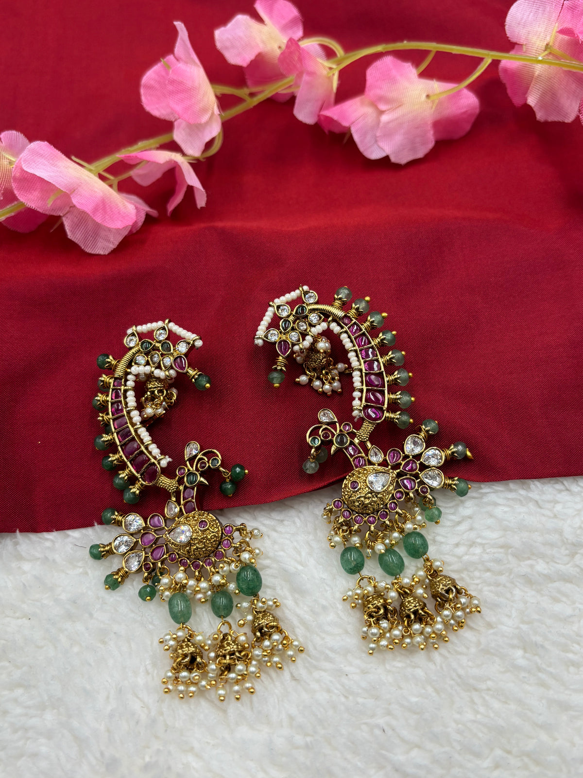 Peacock‑Style Jhumka Earcuff with Ruby, Green Beads & Pearl Drops – Antique Gold Finish