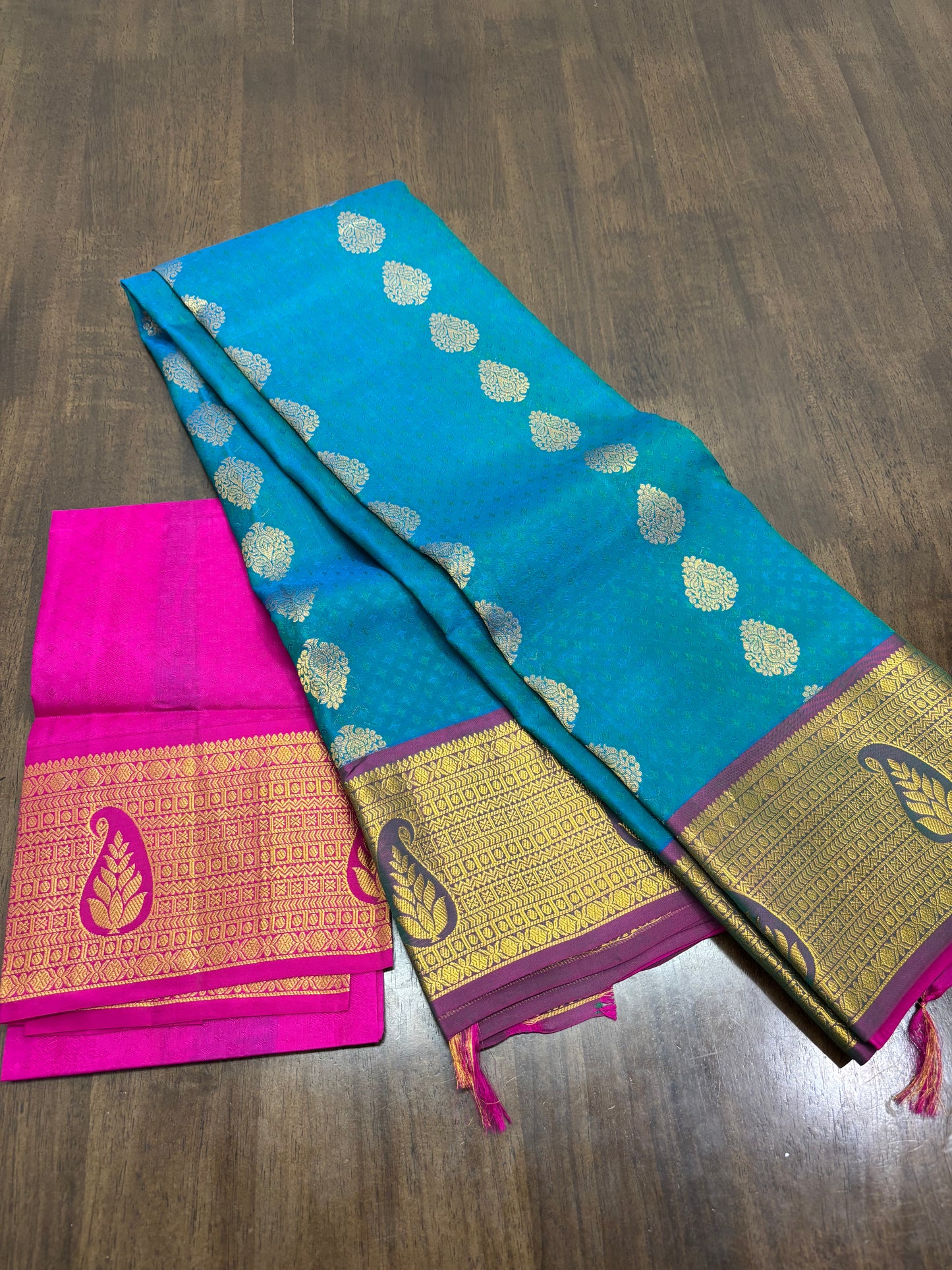 Peacock Green & Rani Pink Pure Kanchipuram Silk Saree with Zari Border