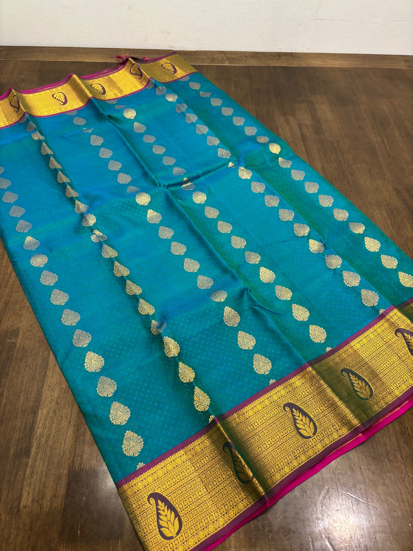 Peacock Green & Rani Pink Pure Kanchipuram Silk Saree with Zari Border