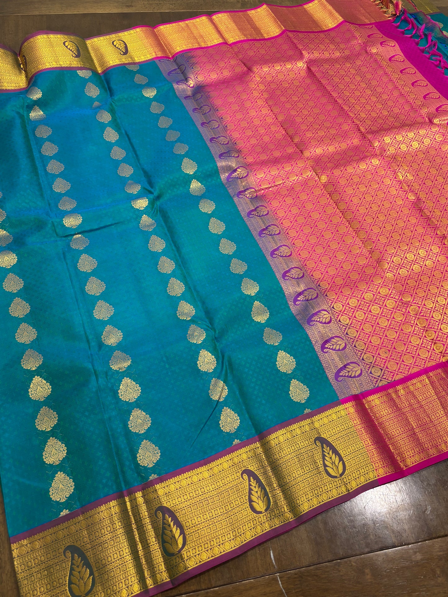 Peacock Green & Rani Pink Pure Kanchipuram Silk Saree with Zari Border