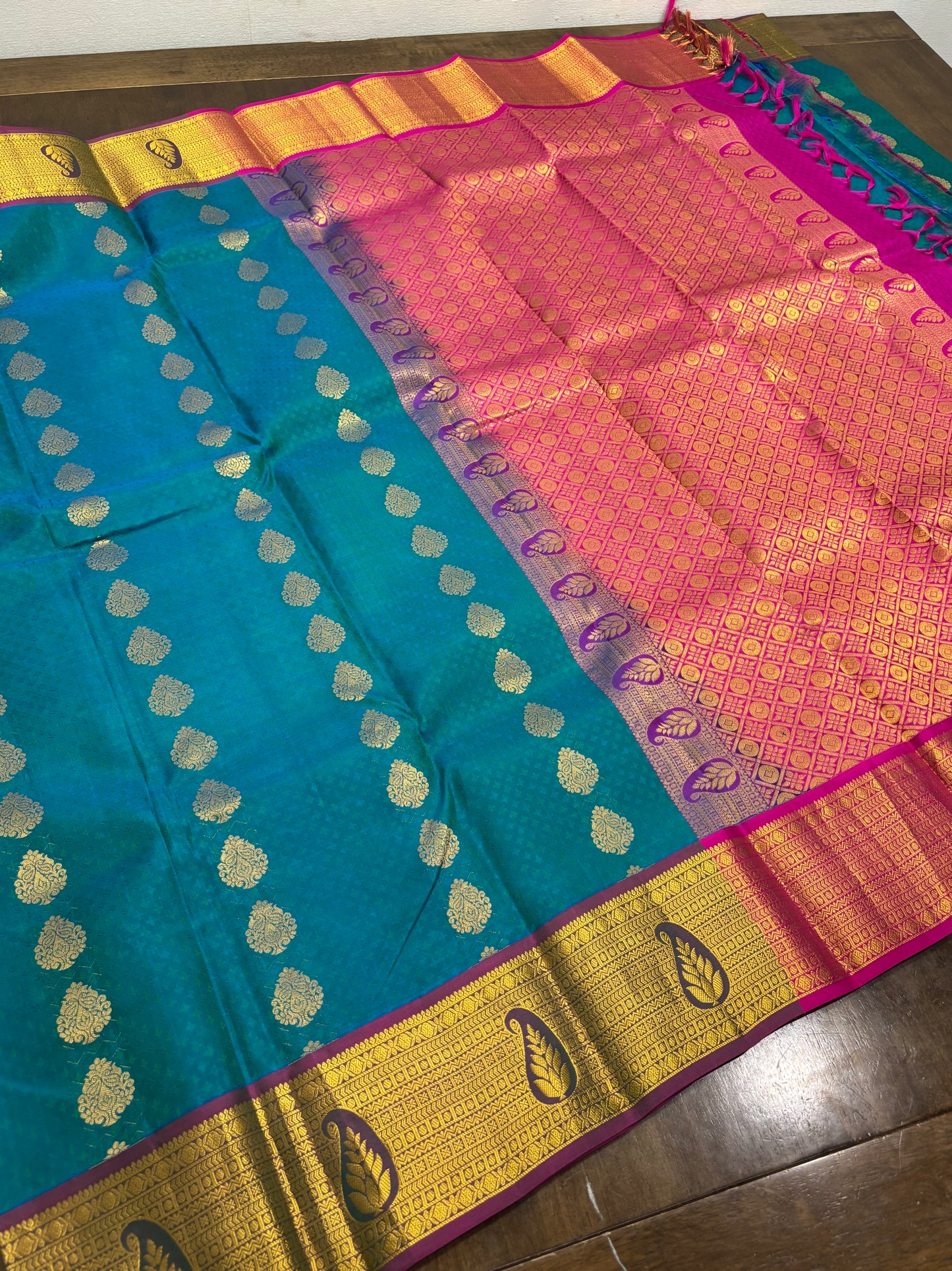 Peacock Green & Rani Pink Pure Kanchipuram Silk Saree with Zari Border
