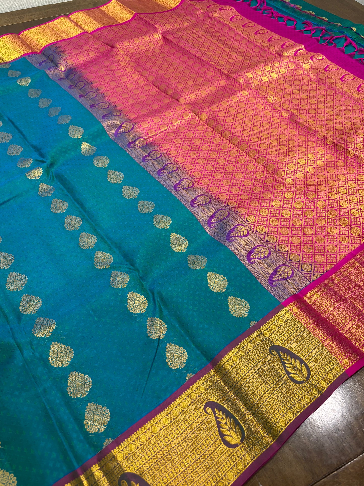 Peacock Green & Rani Pink Pure Kanchipuram Silk Saree with Zari Border
