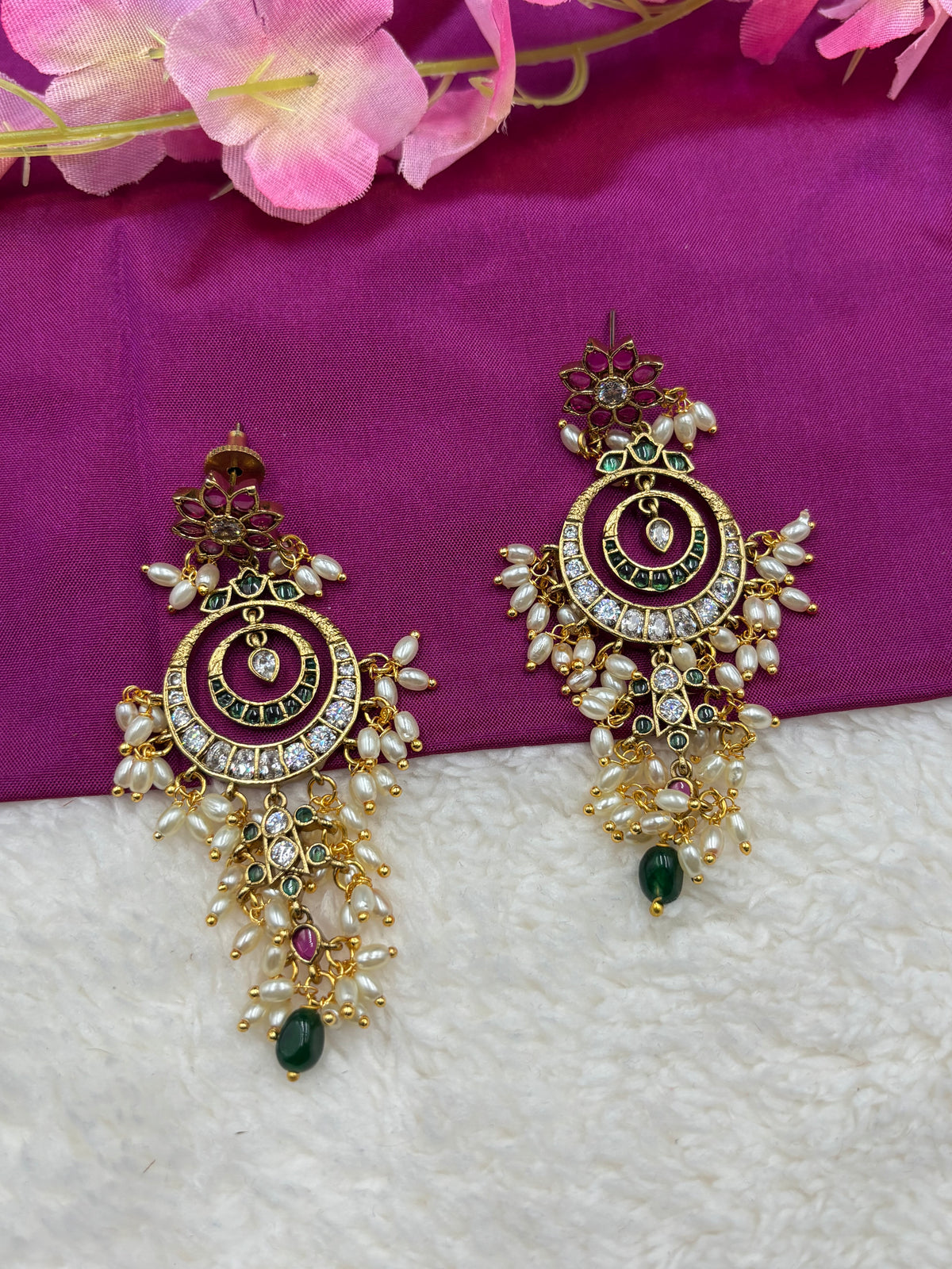 Elegant Gold Spiral Chandbali Earrings with Pearls & Purple Floral Tops
