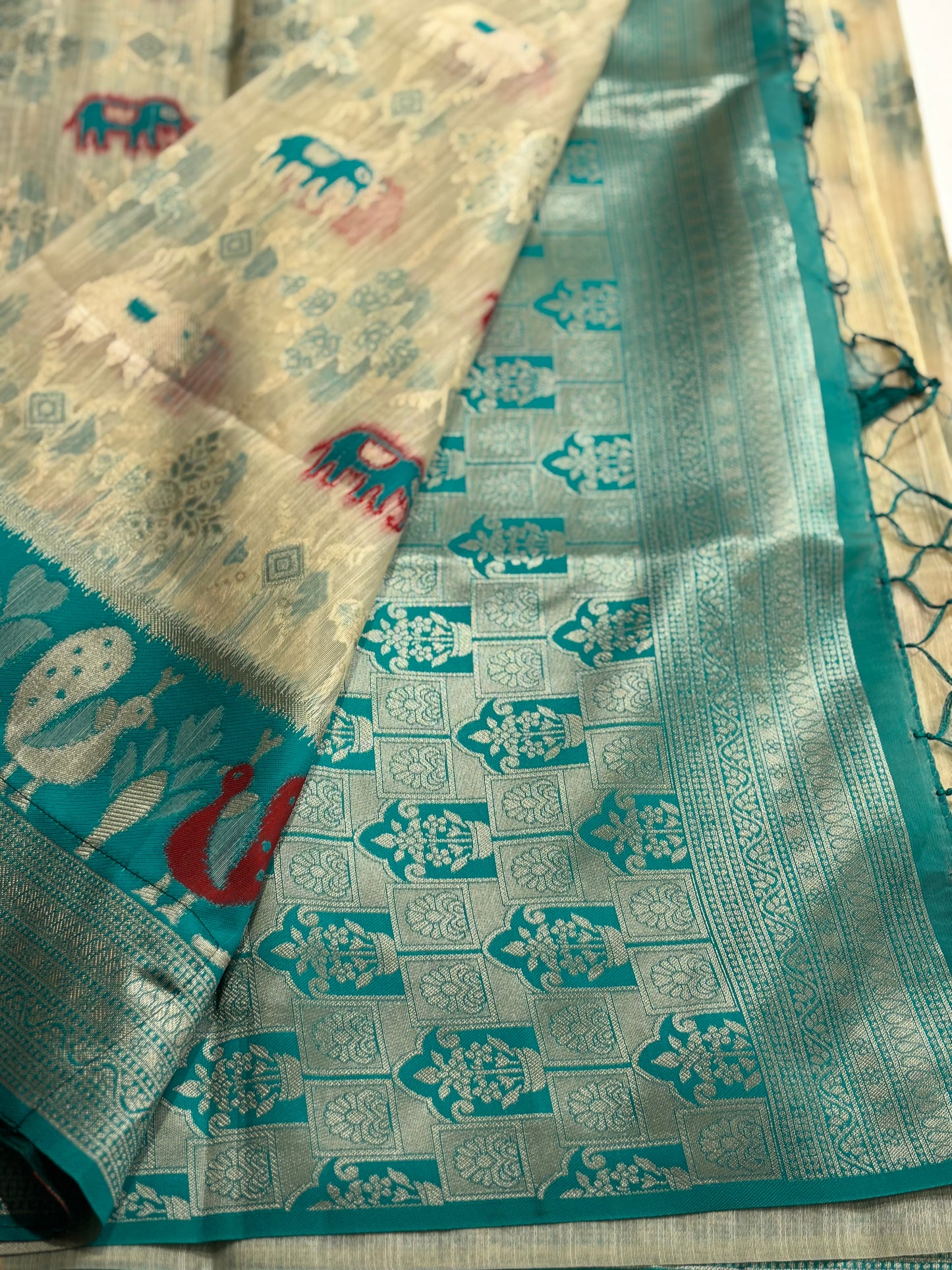 Elegant Silk‑Cotton Jamdani Saree – Cream Body with Elephant Prints and Sky‑Blue Contrast