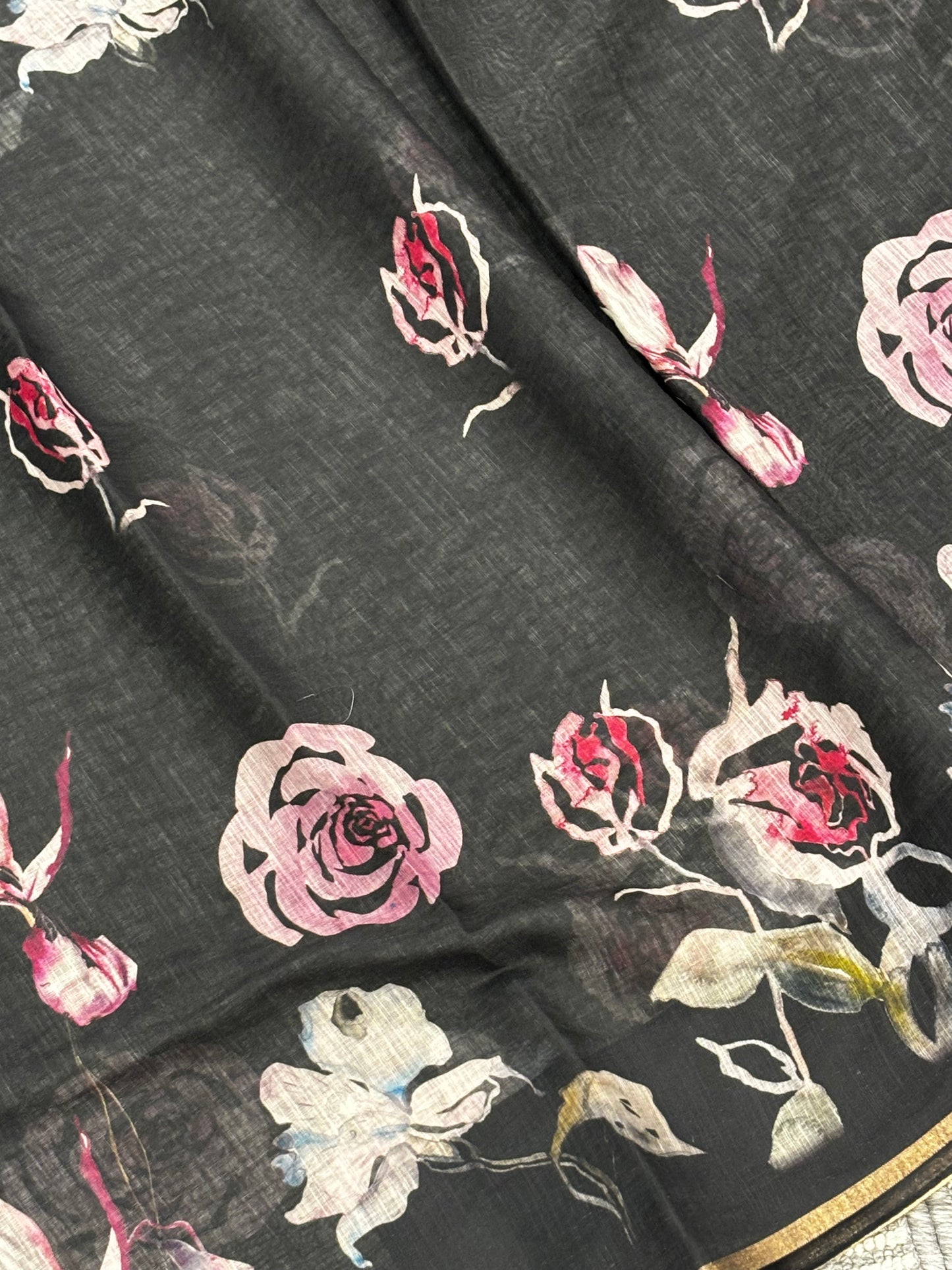 Beautifully Crafted Black Linen Cotton Saree with Floral Print, Golden Border, Tassels & Printed Blouse Piece | Shrees Fashion