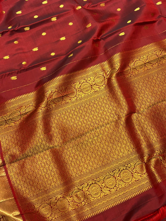 Elegant Maroon Pure Kanchipuram Silk Saree Featuring Traditional Peacock Buttas & Classic Zari Detailing