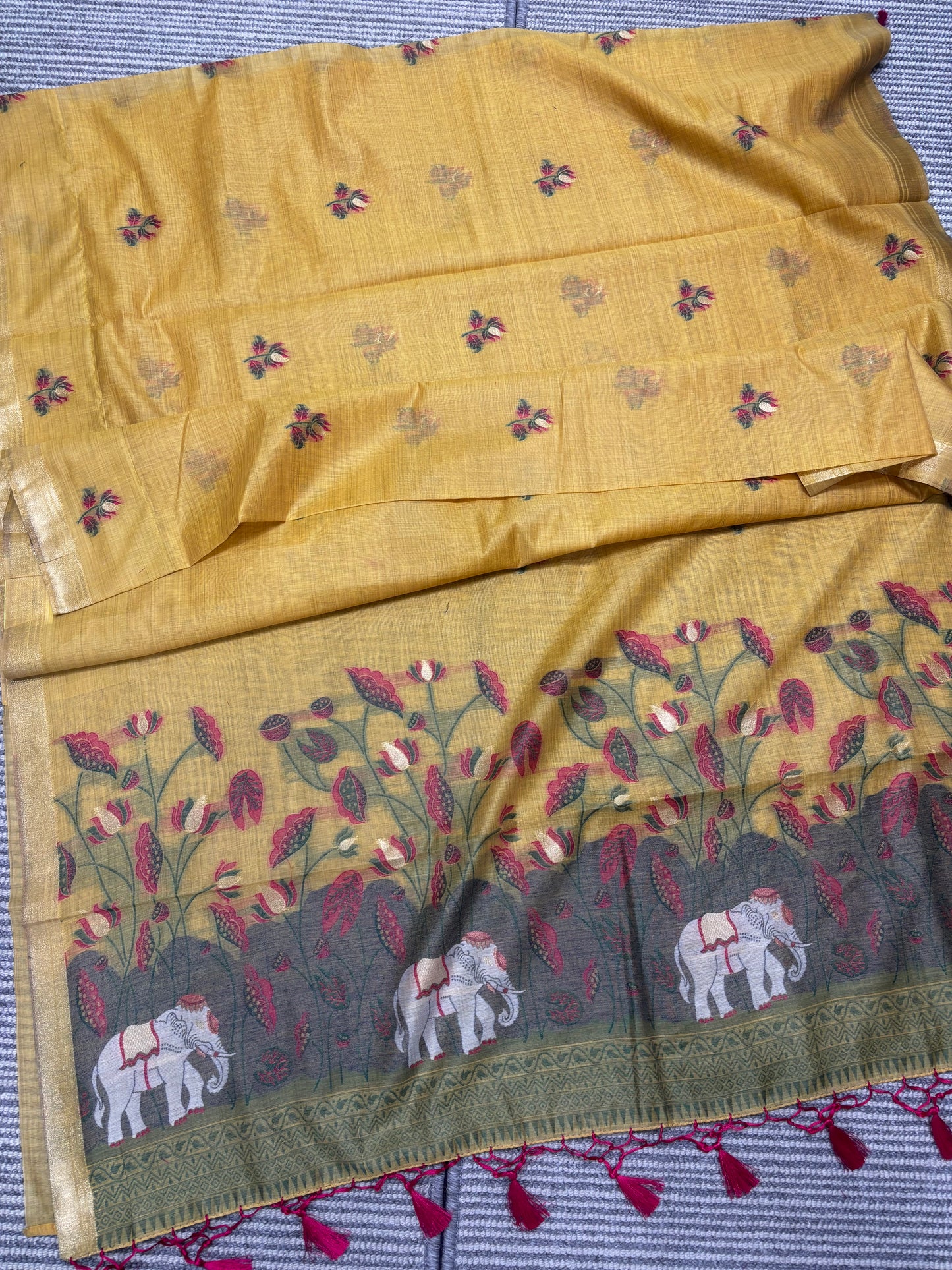 Elegant Yellow Linen Cotton Saree with Floral Print & Elephant Pallu Design