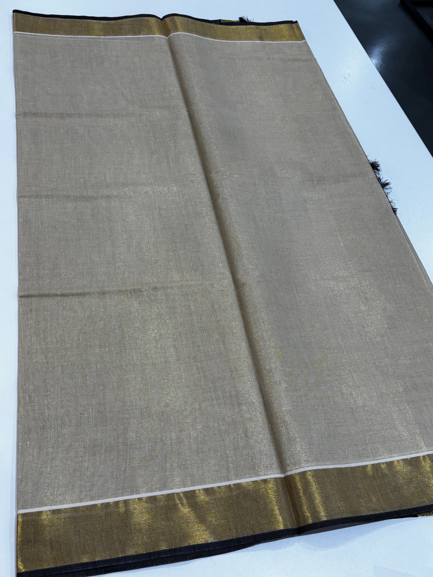 Kerala Kasavu tissue silk saree with coffee brown border and tassels