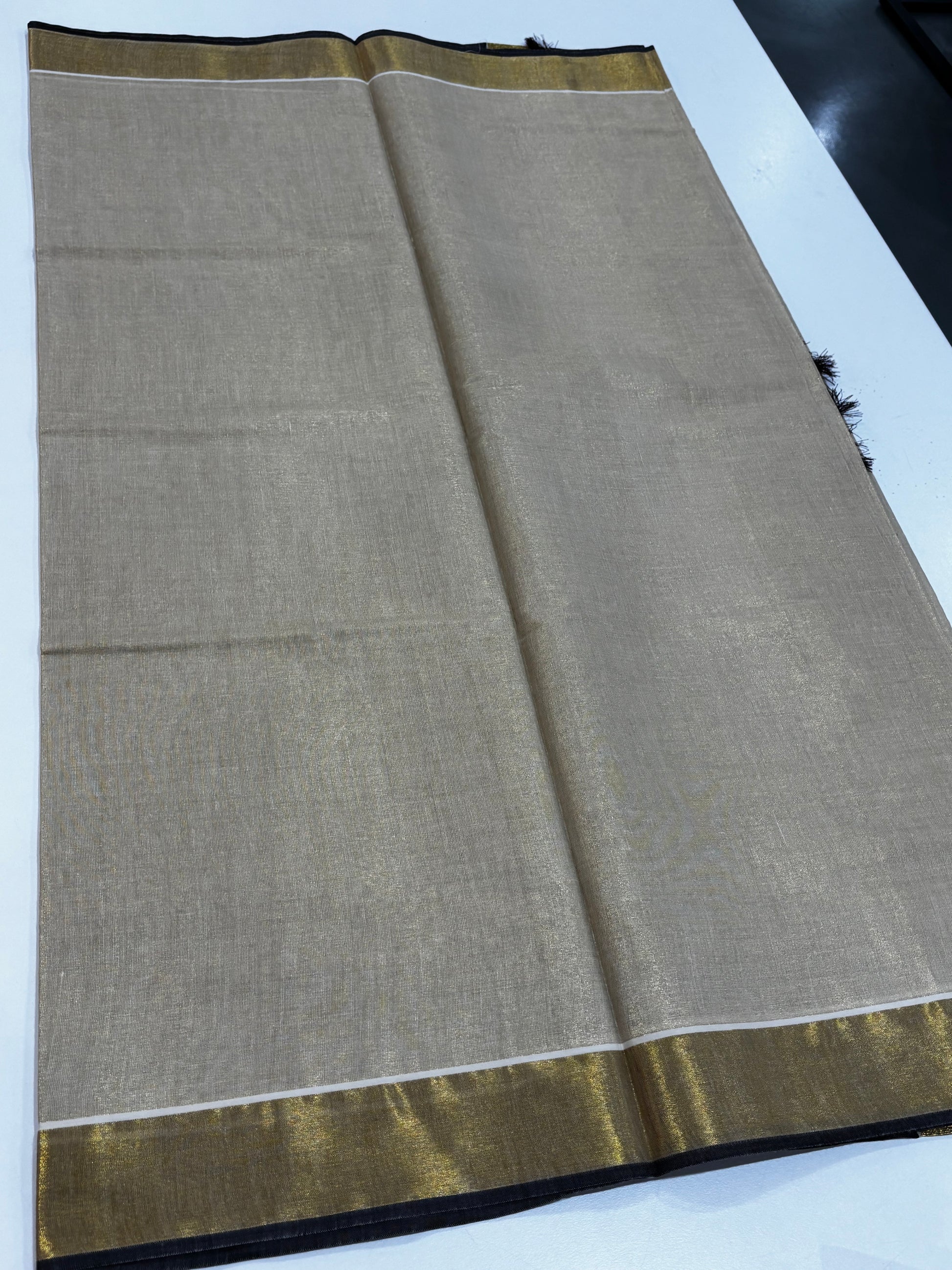 Kerala Kasavu tissue silk saree with coffee brown border and tassels