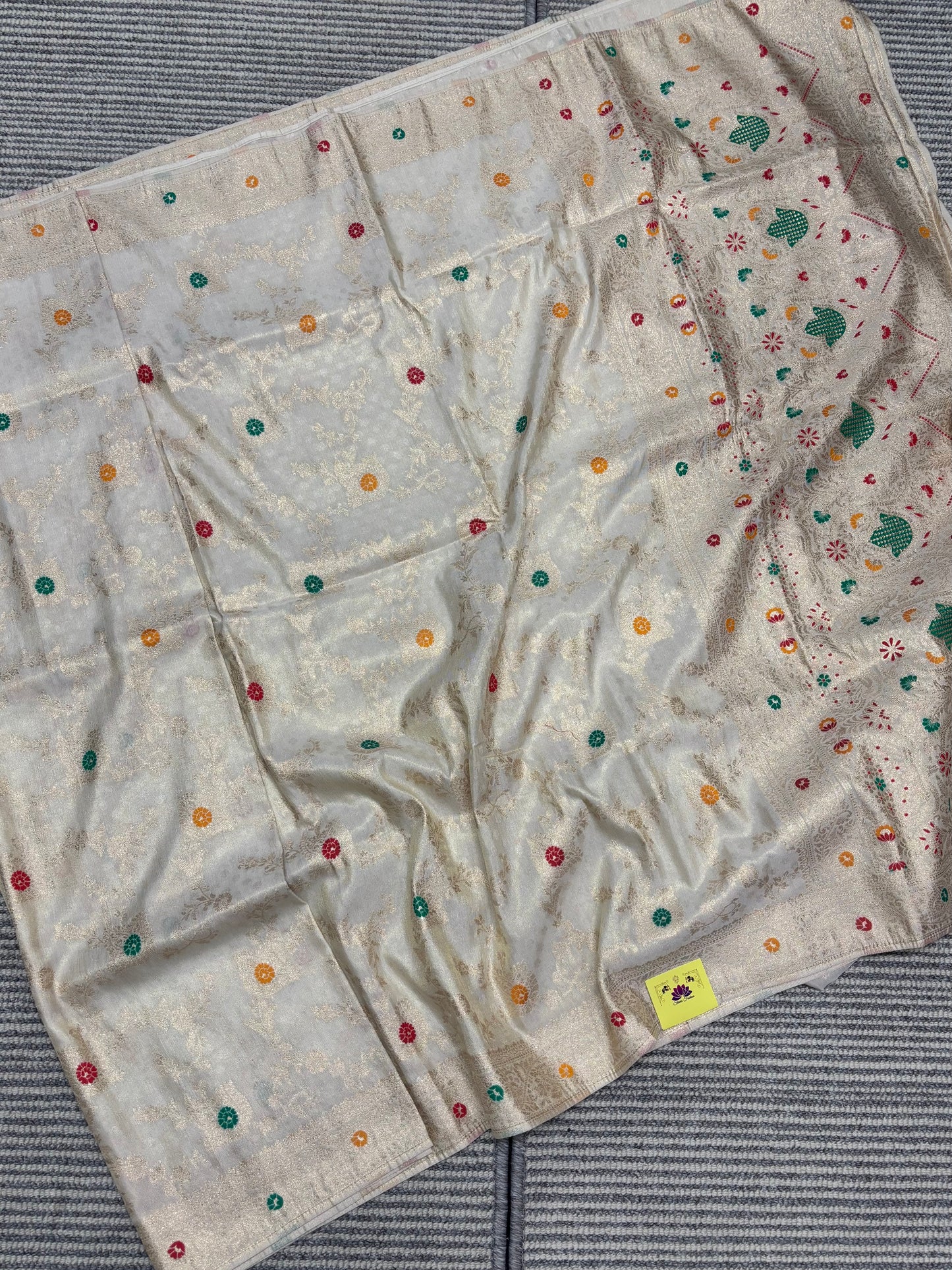 Elegant Cream Banarasi Semi‑Silk Saree with Traditional Meenakari Detailing