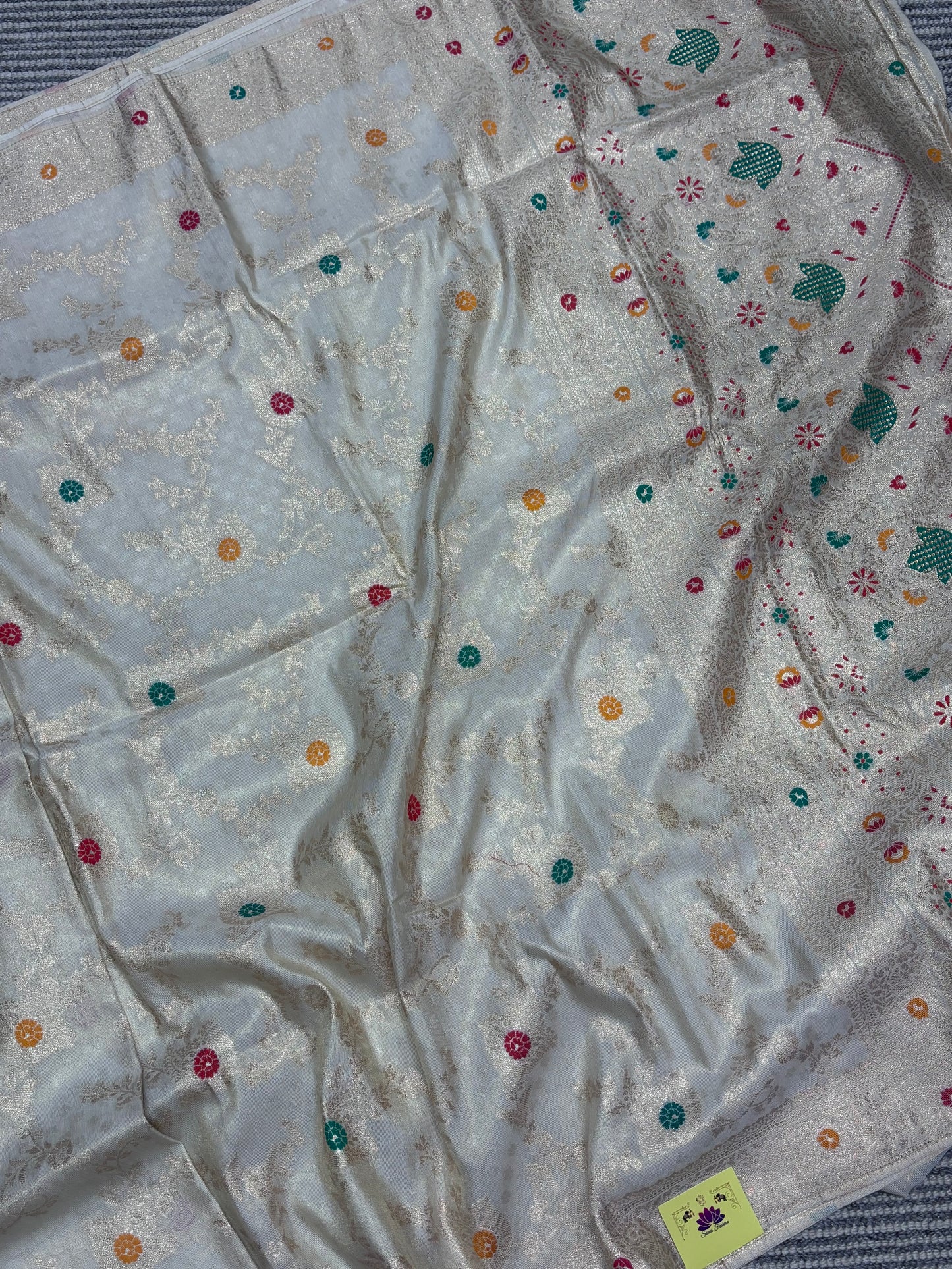 Elegant Cream Banarasi Semi‑Silk Saree with Traditional Meenakari Detailing