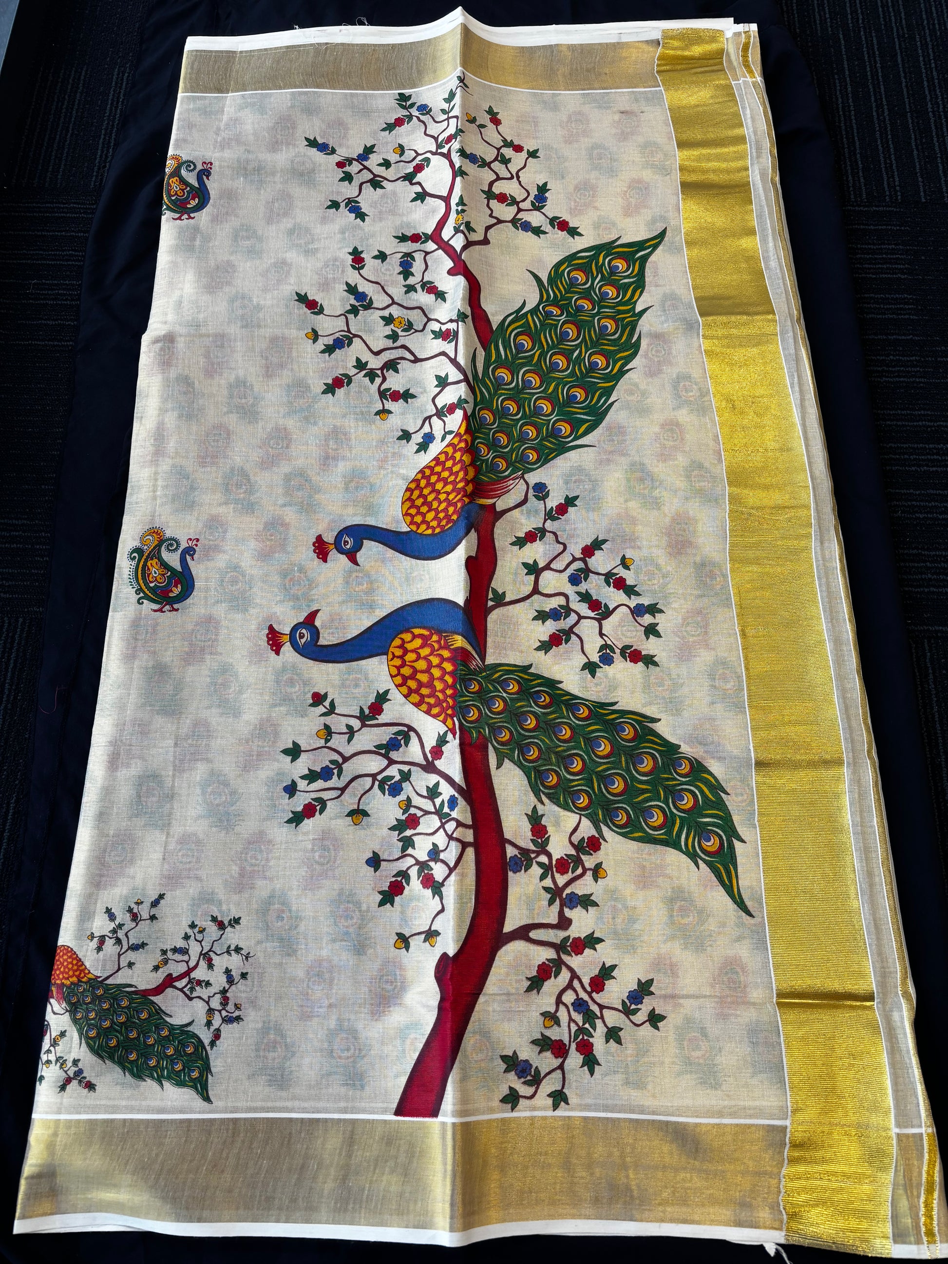Kerala Kasavu tissue silk saree with peacock and floral tree pallu – view 2