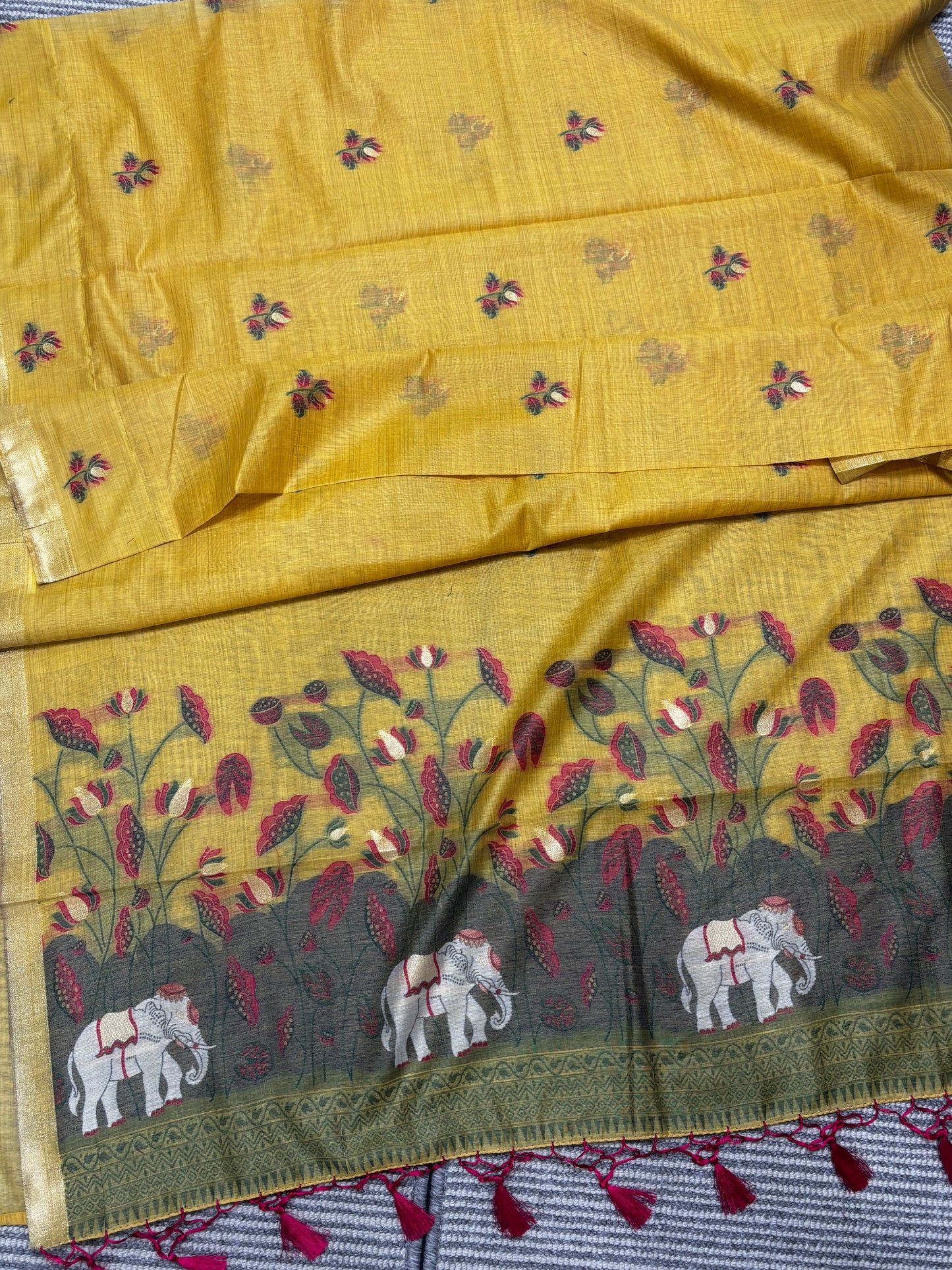 Elegant Yellow Linen Cotton Saree with Floral Print & Elephant Pallu Design