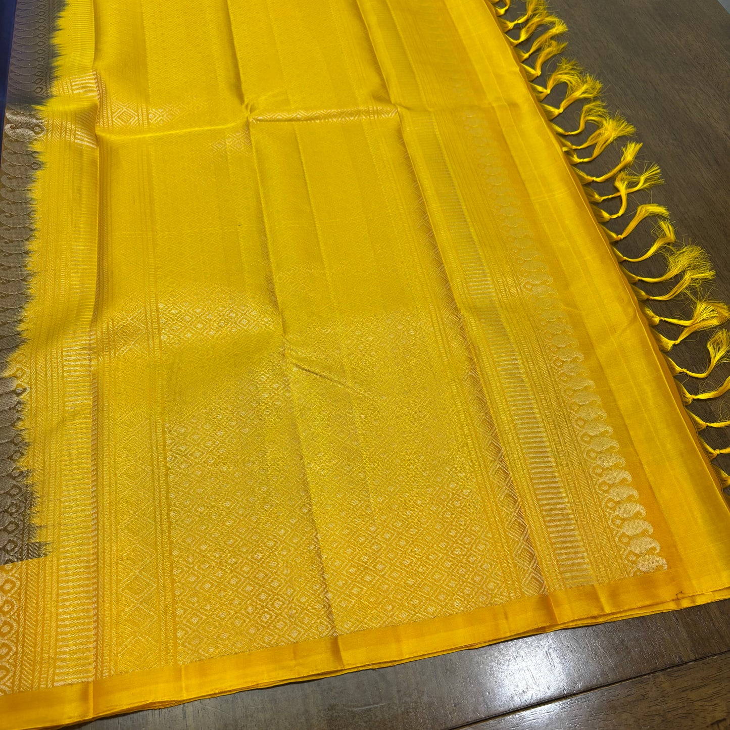 Regal Dark Blue and Yellow Kanchipuram Silk Saree with Silver Zari Work