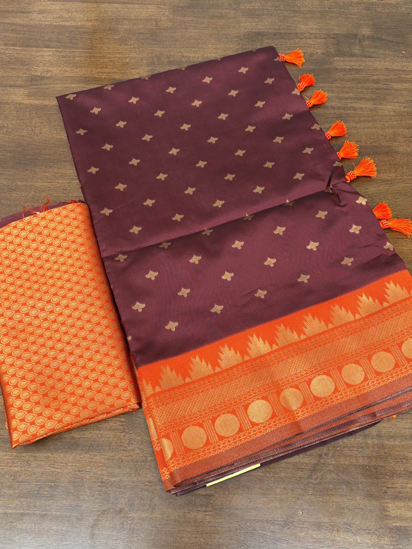 Elegant Deep Maroon Soft Silk Saree Featuring Orange Temple Border