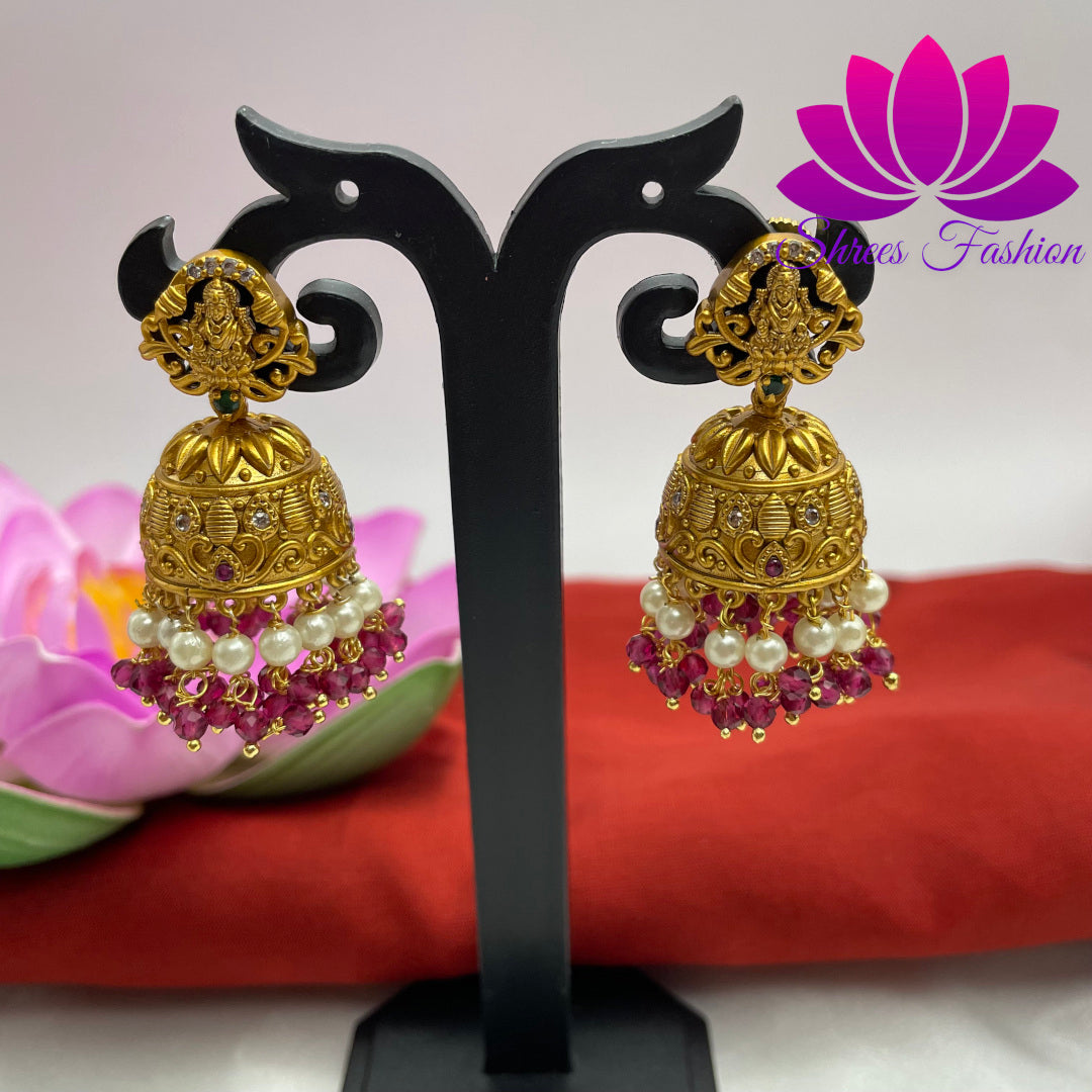 Sacred Radiance: Temple Design Jhumka Embellished with Maroon and White Beads