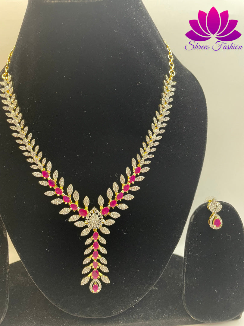 Gold-Plated Leaves Design Necklace with Pink and White Stone Embellishments | Shrees Fashion