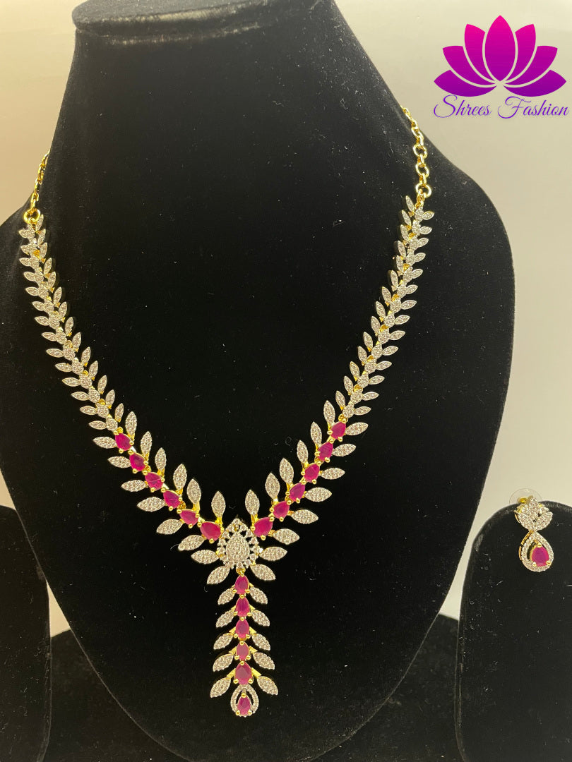 Gold-Plated Leaves Design Necklace with Pink and White Stone Embellishments | Shrees Fashion