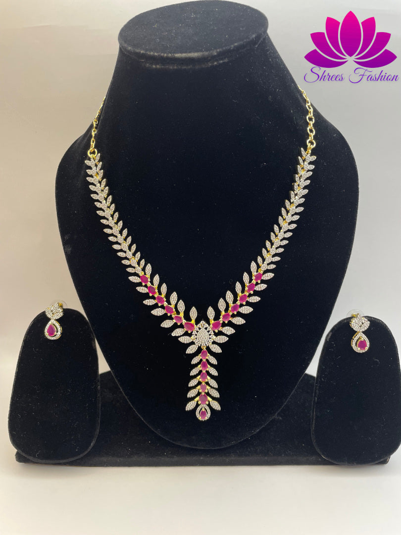 Gold-Plated Leaves Design Necklace with Pink and White Stone Embellishments | Shrees Fashion