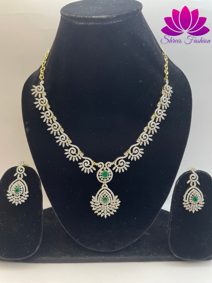 Radiant Elegance Gold-Plated American Diamond Necklace with Central Green Stone | Shrees Fashion