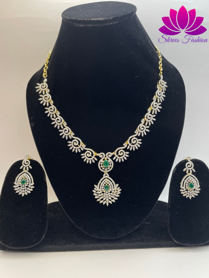 Radiant Elegance Gold-Plated American Diamond Necklace with Central Green Stone | Shrees Fashion