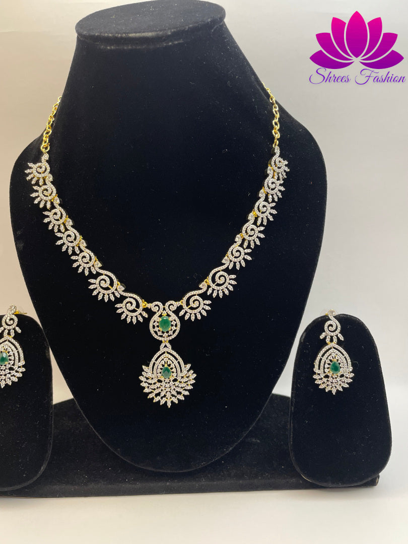 Radiant Elegance Gold-Plated American Diamond Necklace with Central Green Stone | Shrees Fashion