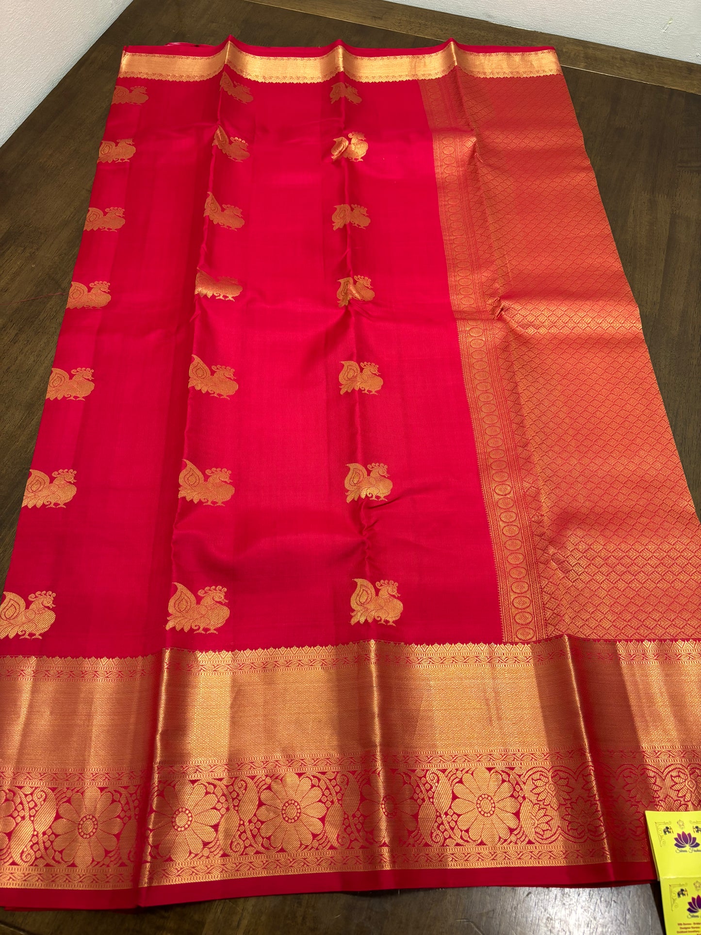 Raspberry Pink Kanchipuram Silk Saree with Gold Zari Peacock Buttas