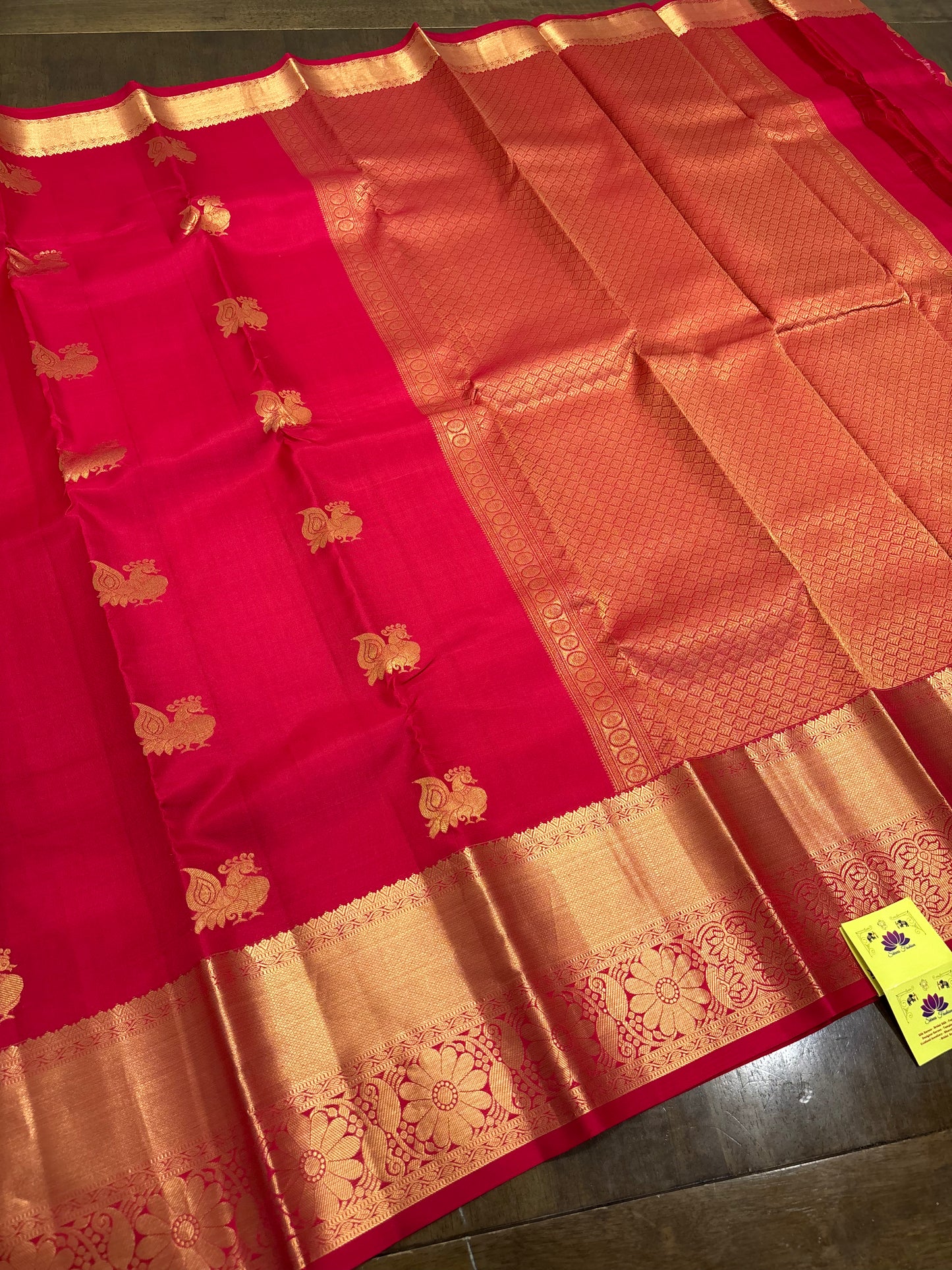 Raspberry Pink Kanchipuram Silk Saree with Gold Zari Peacock Buttas