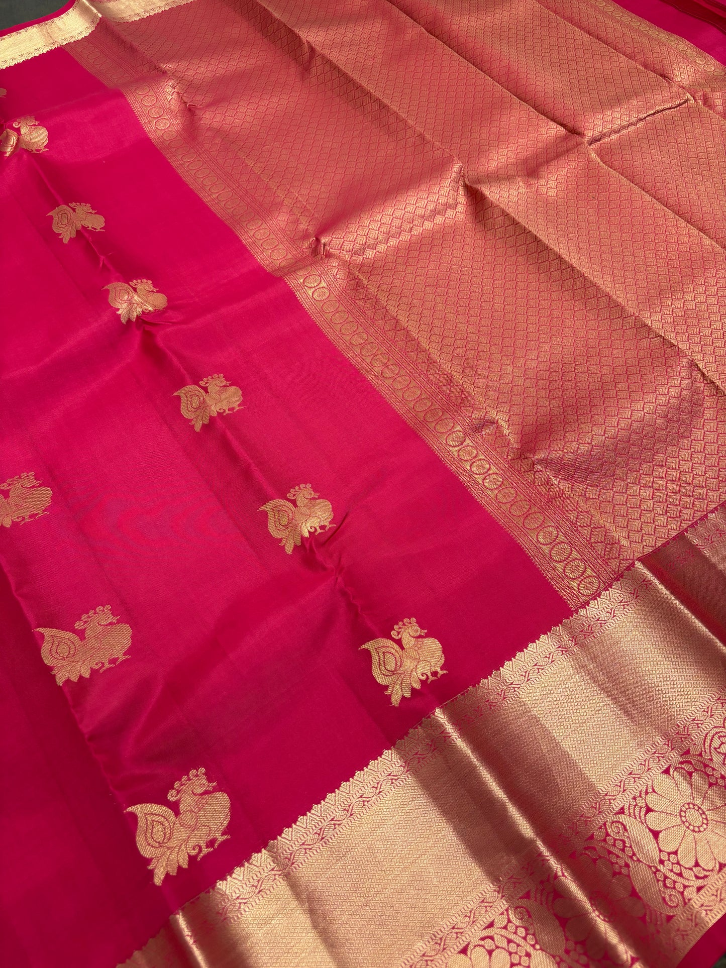Raspberry Pink Kanchipuram Silk Saree with Gold Zari Peacock Buttas