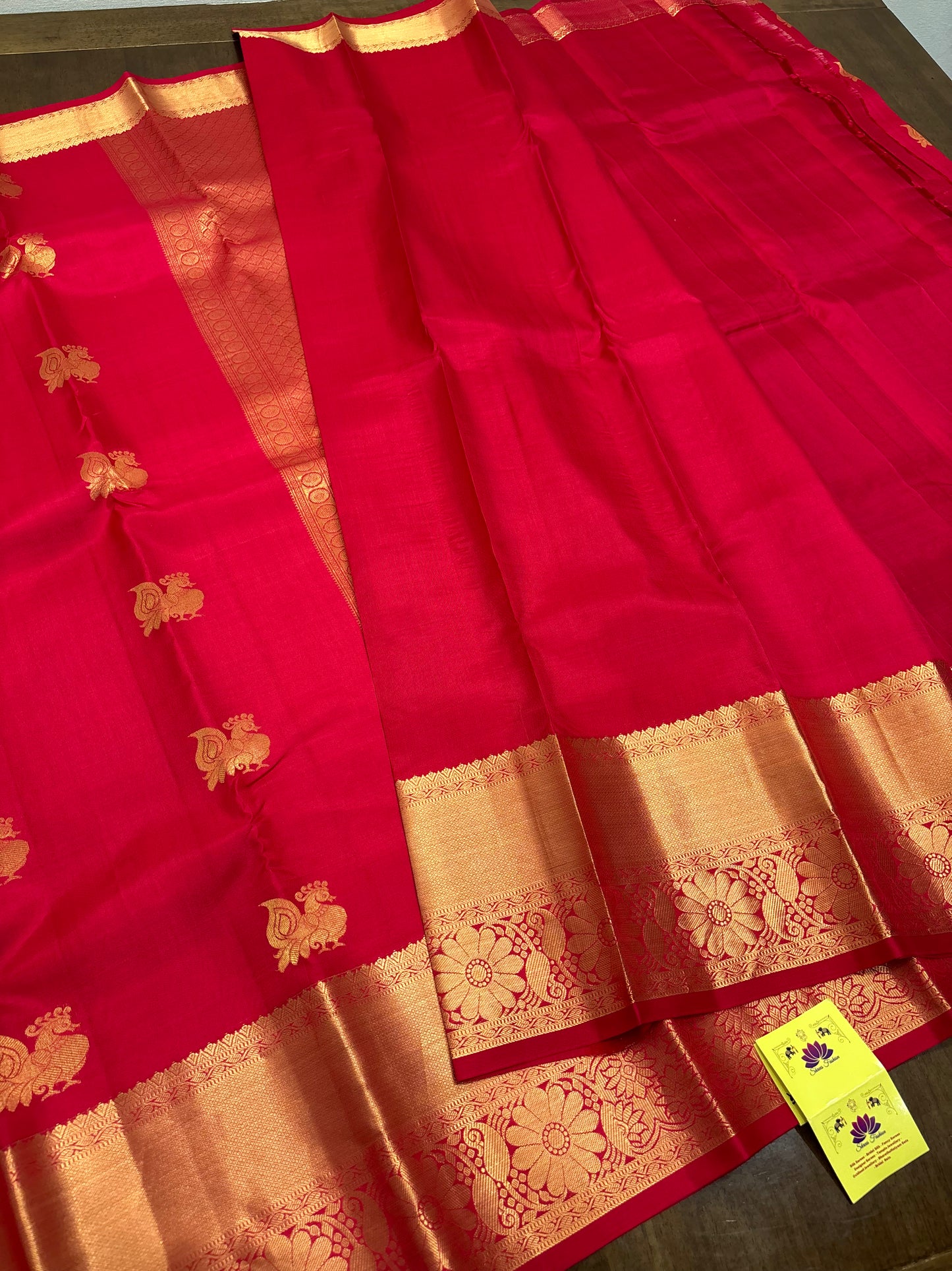 Raspberry Pink Kanchipuram Silk Saree with Gold Zari Peacock Buttas