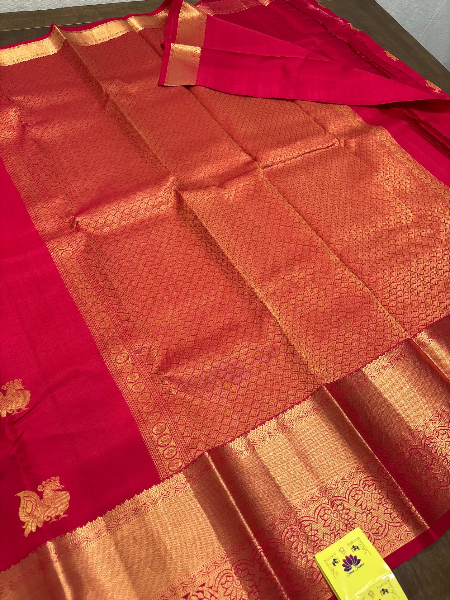 Raspberry Pink Kanchipuram Silk Saree with Gold Zari Peacock Buttas